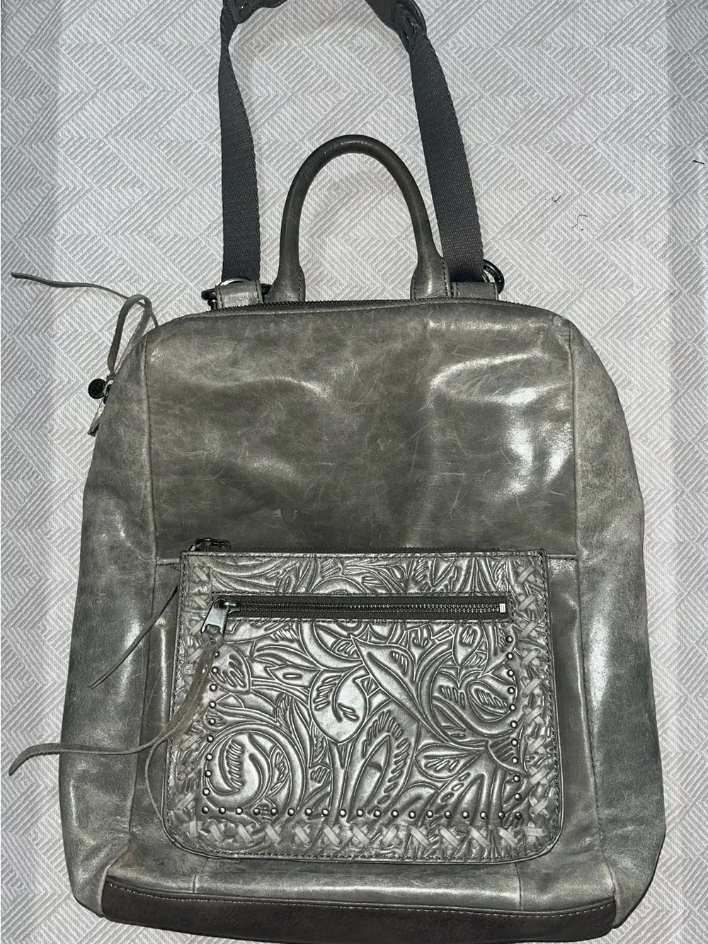 The Sak Metallic Gray Embossed Leather Backpack